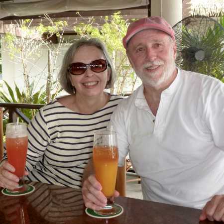 Brenda Ross and her husband Paul Skillin sit at a bar, drinks in hand