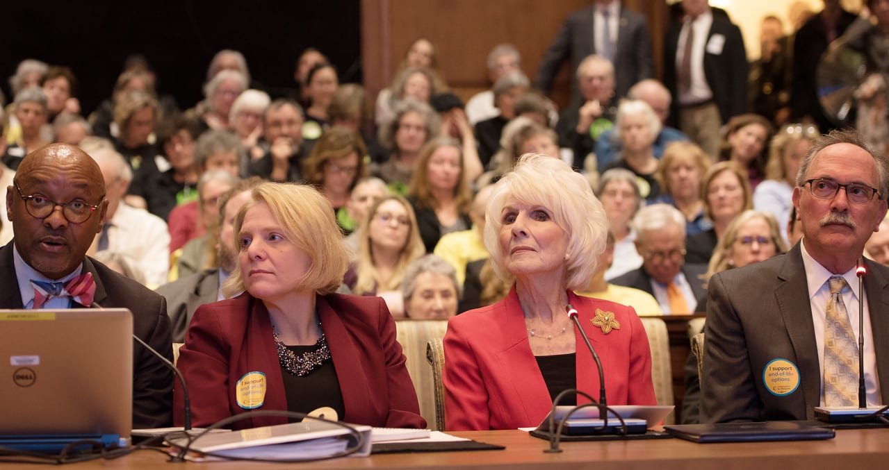 Rev. Charles McNeil, Kim Callinan, Diane Rehm and Dr. Michael Strauss testifying at Maryland hearing on February 15, 2019.