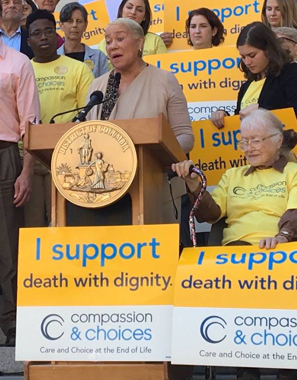 Dr. Omega Silva speaking at news conference in support of D.C. Death with Dignity Act.