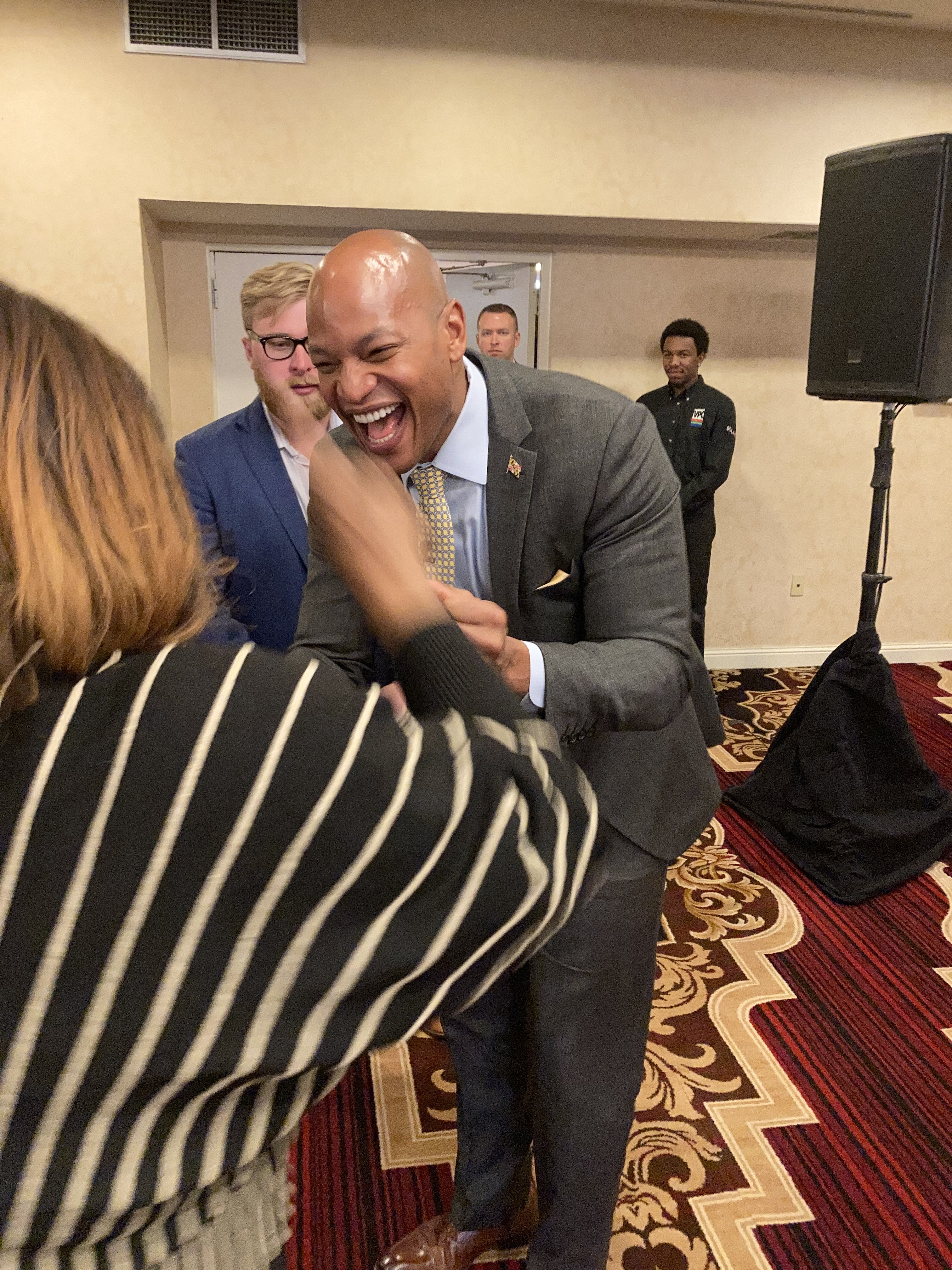 Gov.-elect Wes Moore greets Compassion & Choices  Action Network Maryland Campaign Director Donna Smith